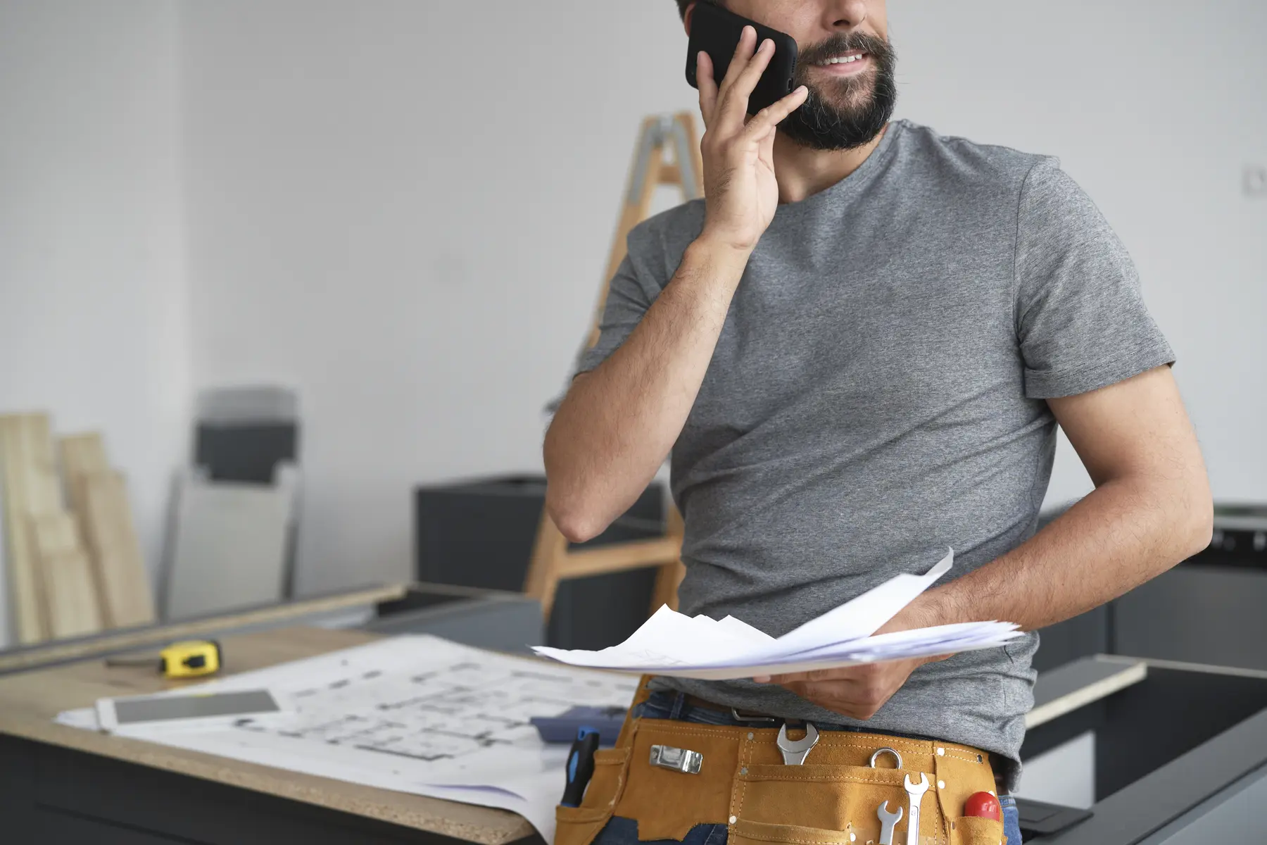Somebody on the phone with the paperwork still in his hand